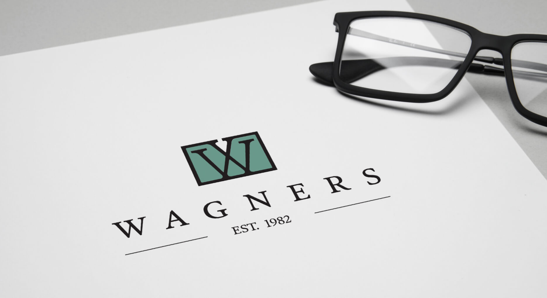 Wagners logo in teal on paper